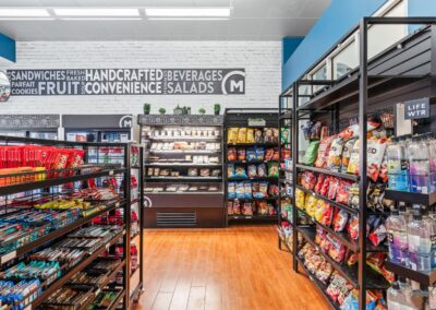 View of UC's convenience market serving Starbucks Coffee and sells snacks, home essentials, & packaged meals.